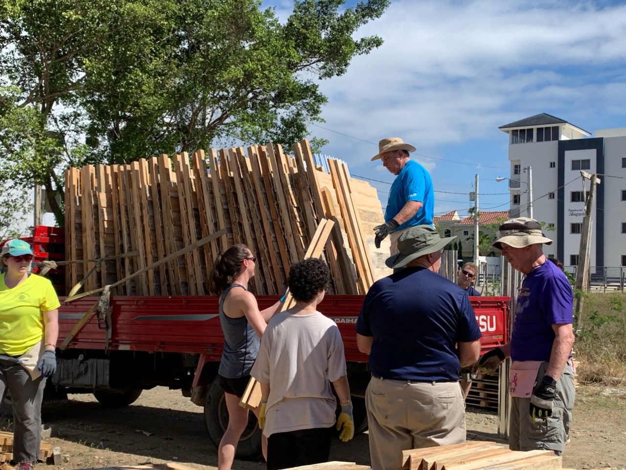 2019 DR - Loading a truck Loading latrine materials in a truck to be transported to the job site to be built. 2019