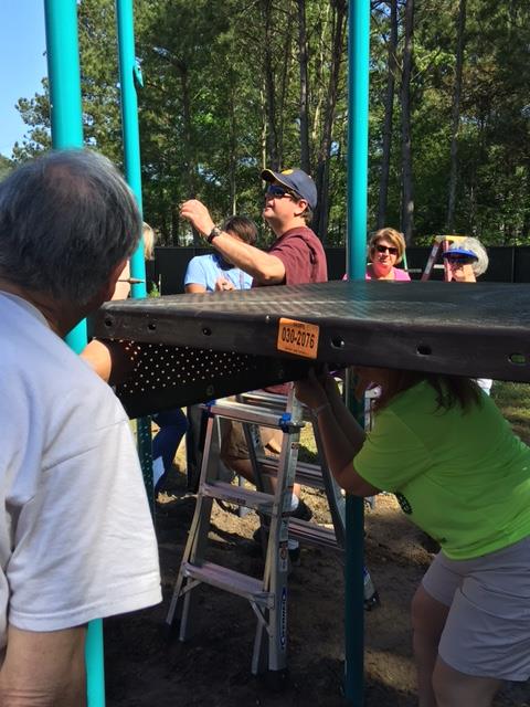 Building the Playground Equipment The crew built the playground equipment.