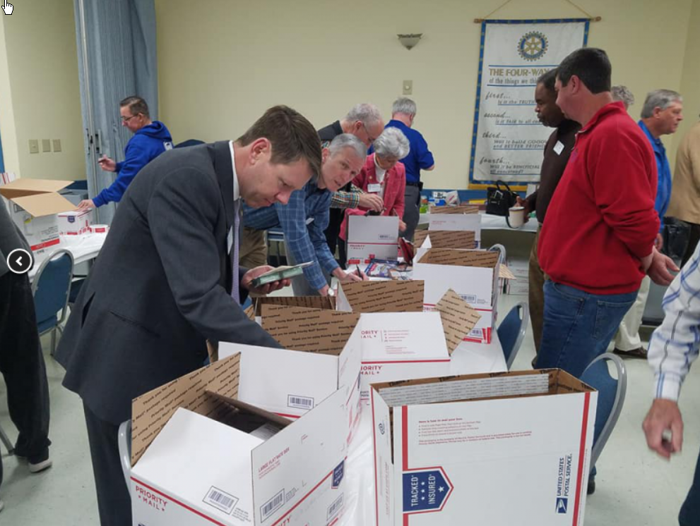 Adopt-A-Platoon Making sure we packed the boxes as full as possible!