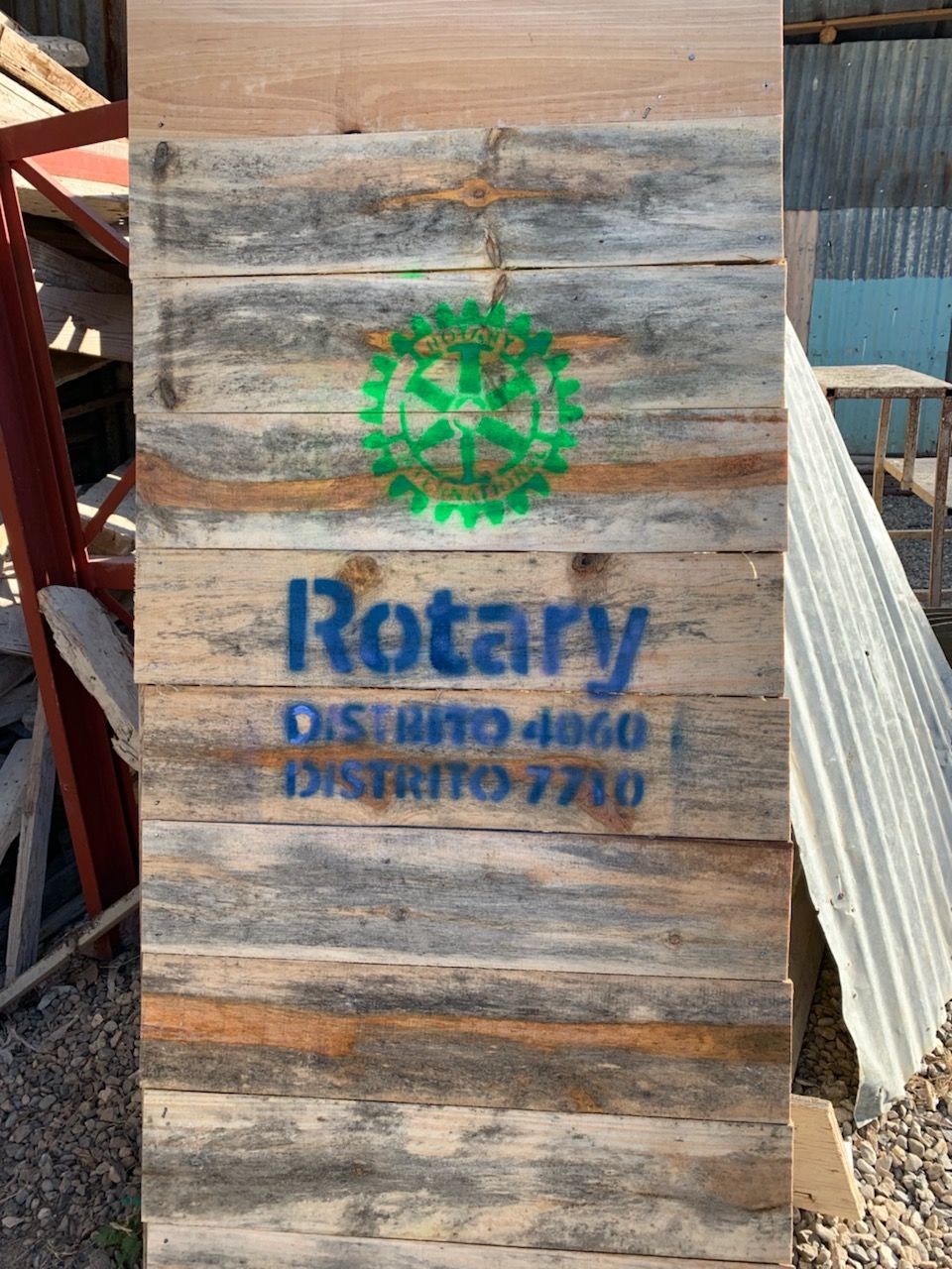 Door to Latrine_2019 The door to the latrines were painted with the Rotary Wheel and the names of the two Districts participating.
