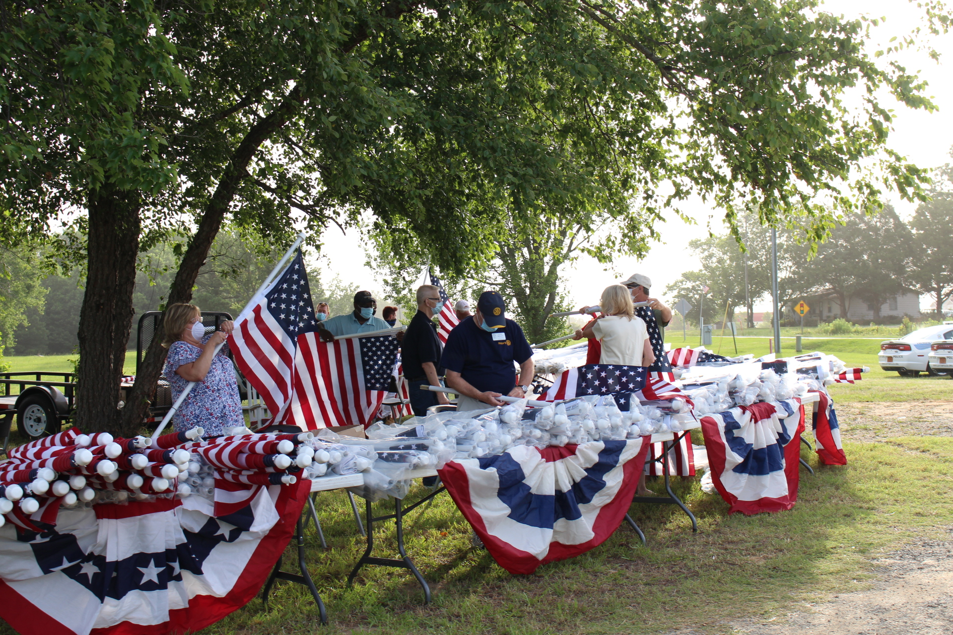 Flags For Heroes 2020 Clayton Rotarians putting together flags and attaching Medallions the morning of our 1st Flags For Heroes event 2020
