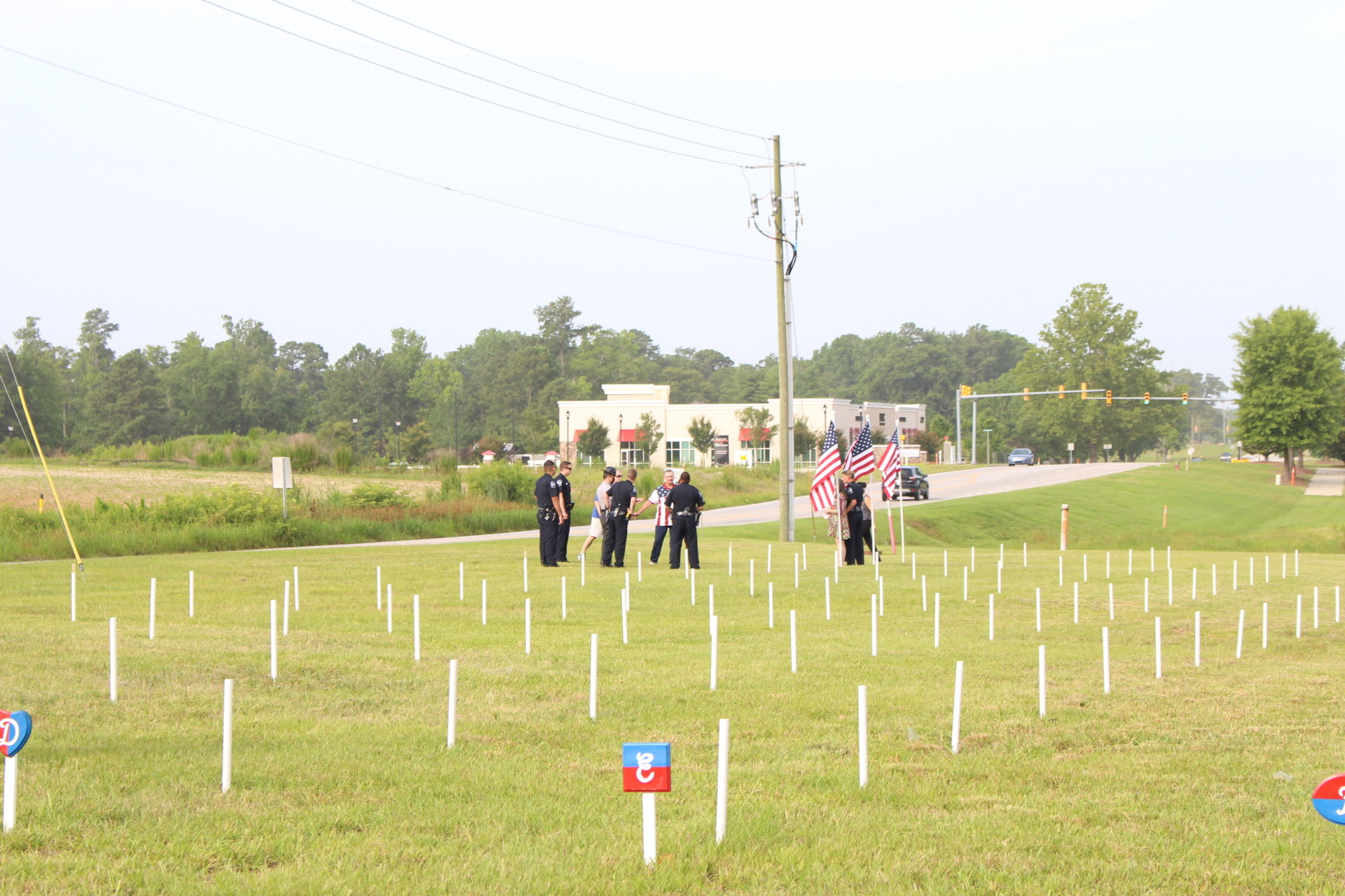 Flags For Heroes 2020 Clayton PD installing flags