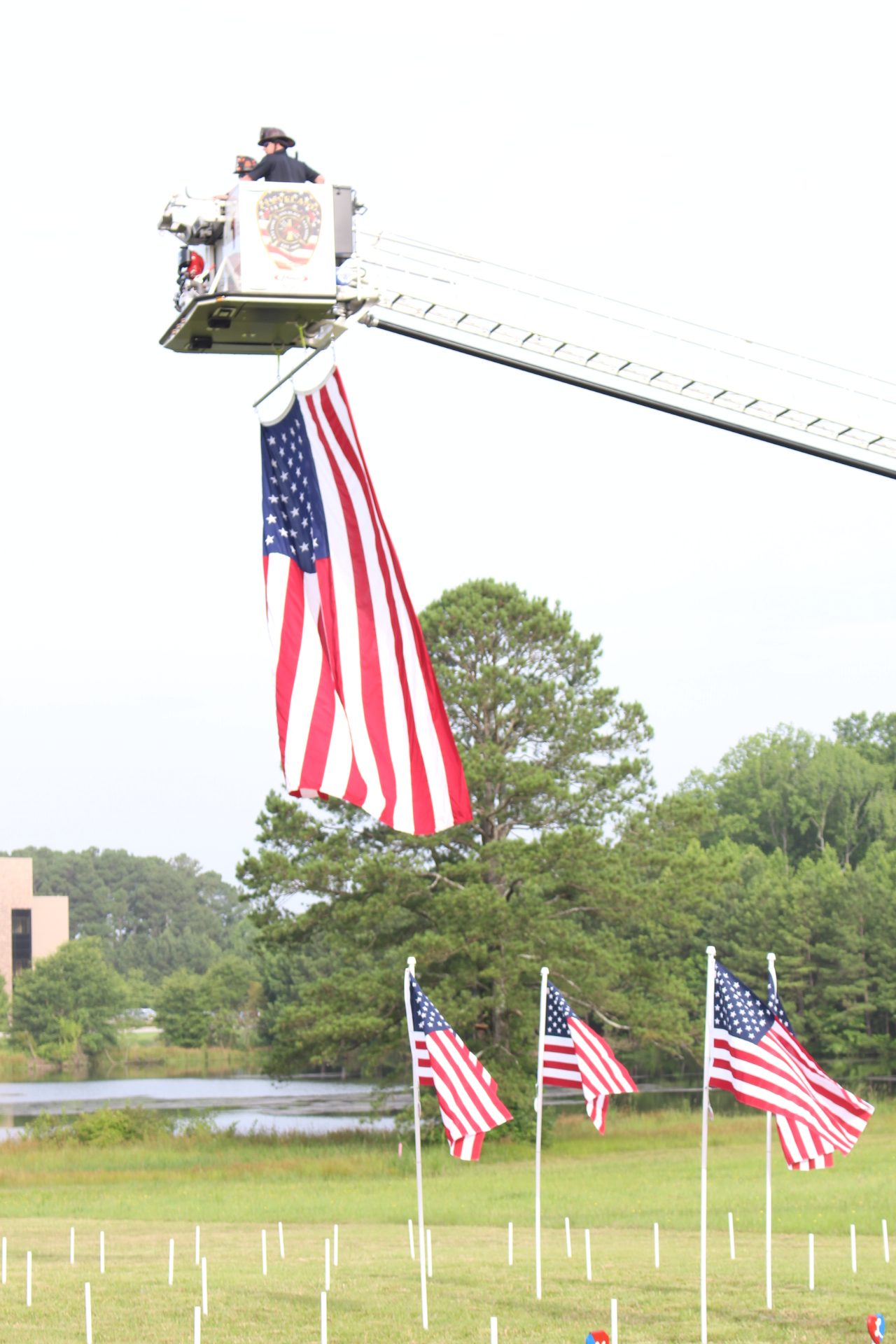 Flags For Heroes 2020 Cleveland Fire Department using their ladder truck to fly a huge flag at Flags For Heroes 2020